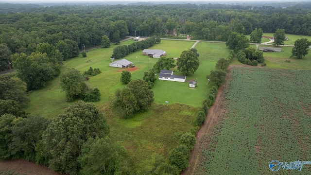 birds eye view of property with a rural view