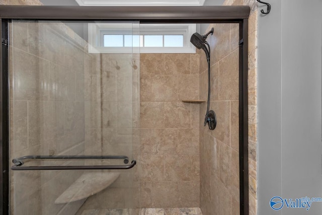 bathroom featuring walk in shower