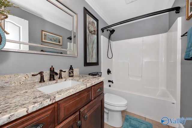 full bathroom featuring tile patterned flooring, crown molding, toilet, shower / washtub combination, and vanity