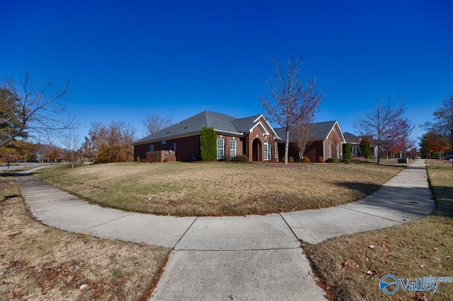 view of front of home with a front yard