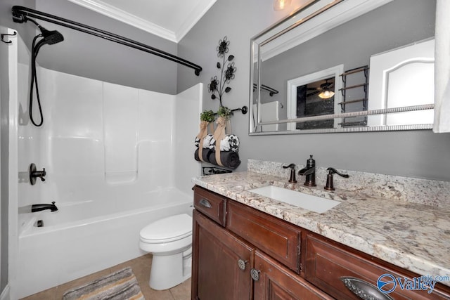 full bathroom with vanity, tile patterned floors, toilet, ornamental molding, and shower / bathtub combination