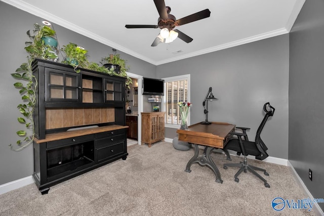 office area with carpet, ceiling fan, and crown molding