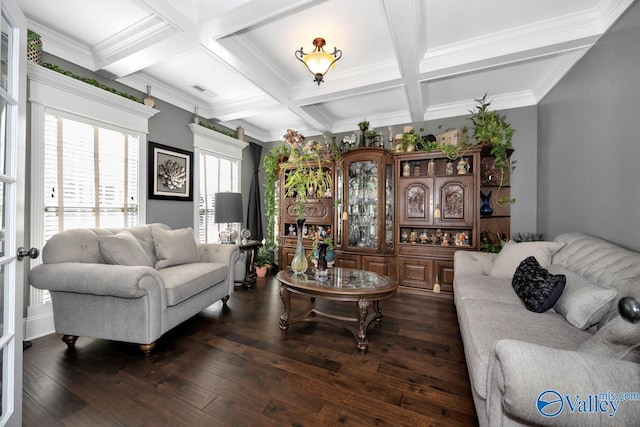 living room with beam ceiling, dark hardwood / wood-style flooring, coffered ceiling, and ornamental molding