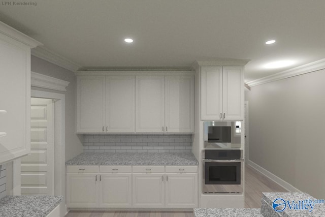 GREENLAND-D Newby Chapel Rd, Athens, AL 35613 - kitchen with oven, crown molding, white cabinetry, tasteful backsplash, and light countertops