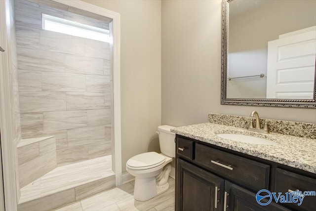 GREENLAND-D Newby Chapel Rd, Athens, AL 35613 - bathroom with vanity, toilet, and tiled shower