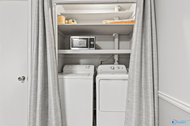 1201 Bailey Cove Cir SE # D, Huntsville, AL 35802 - laundry area featuring washer and dryer