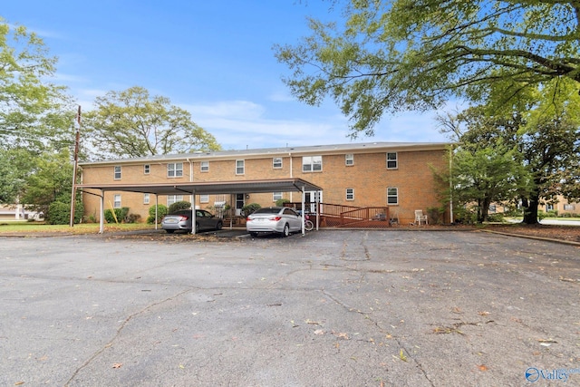 1201 Bailey Cove Cir SE # D, Huntsville, AL 35802 - view of building exterior featuring covered parking