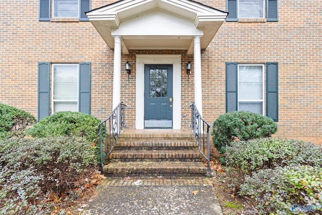 1201 Bailey Cove Cir SE # D, Huntsville, AL 35802 - view of exterior entry featuring brick siding