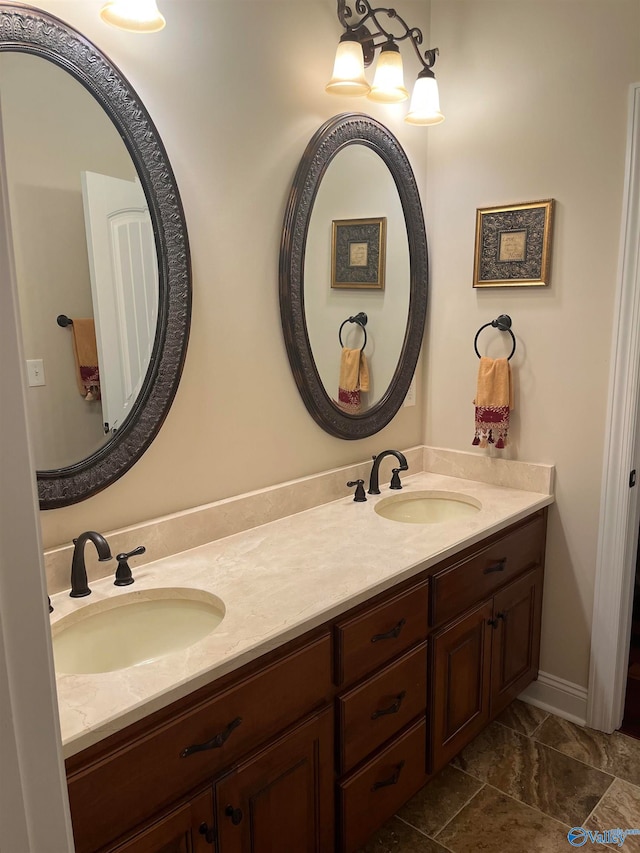 bathroom with tile patterned floors and double sink vanity