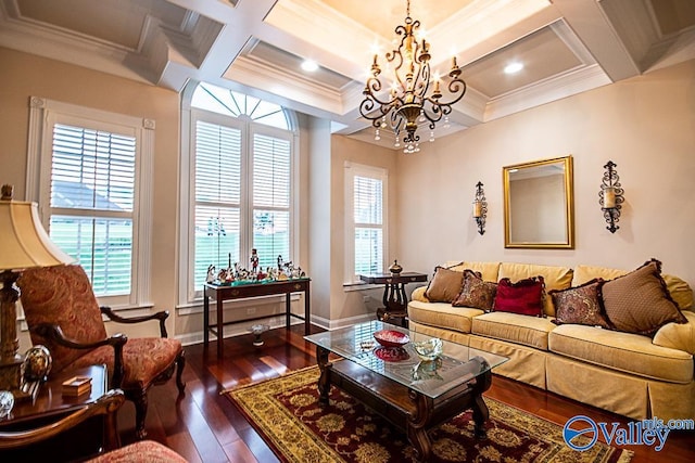 living room featuring a notable chandelier, coffered ceiling, hardwood / wood-style flooring, and crown molding