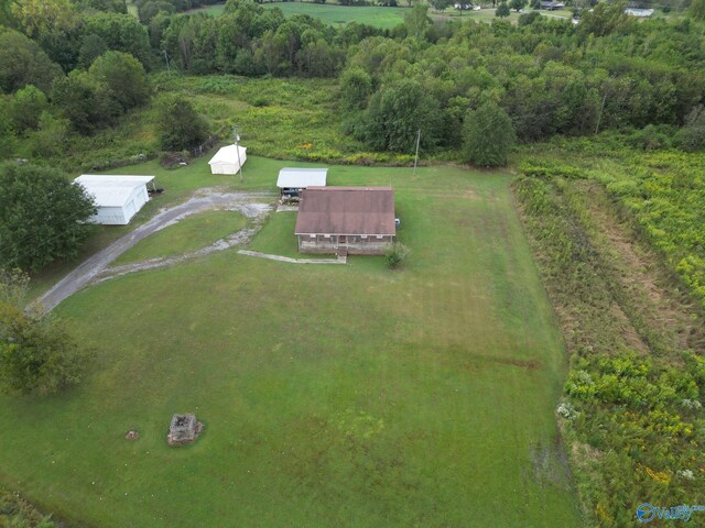 birds eye view of property featuring a rural view