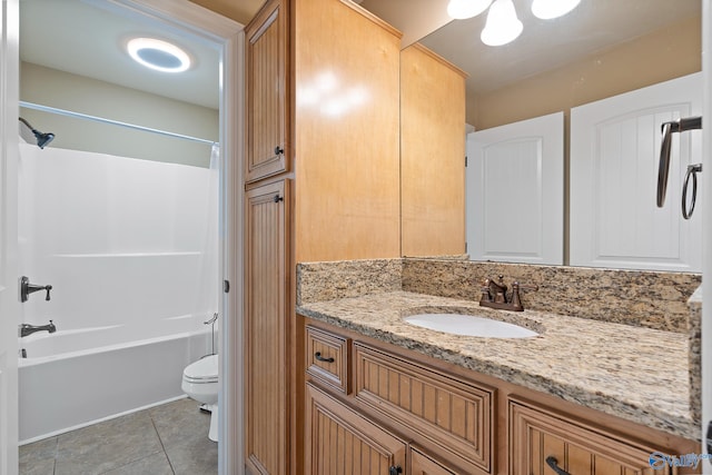 full bathroom featuring tile patterned flooring, shower / bathing tub combination, vanity, and toilet