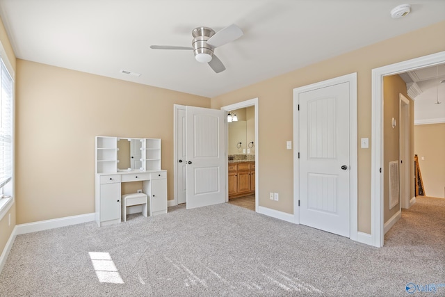 unfurnished bedroom featuring baseboards, attic access, visible vents, and carpet flooring