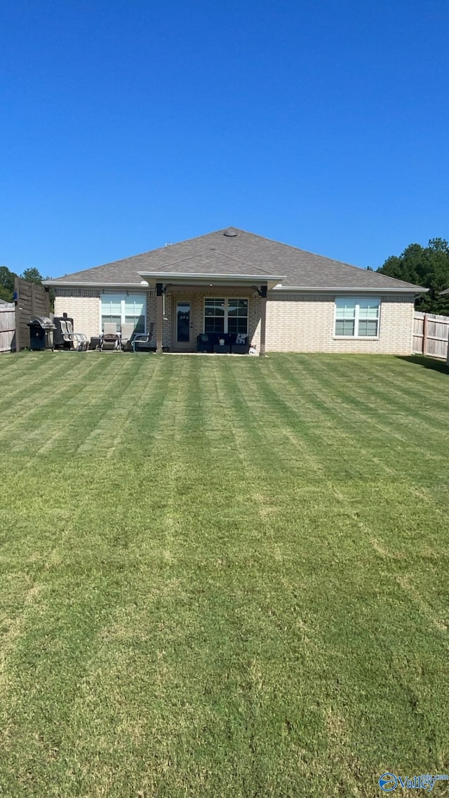 exterior space with a yard