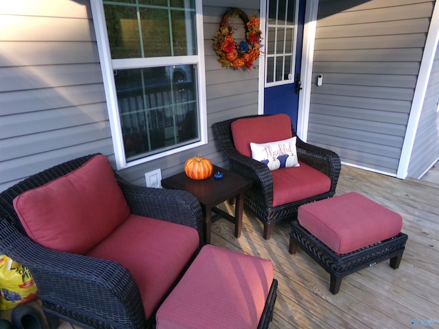 deck with an outdoor hangout area