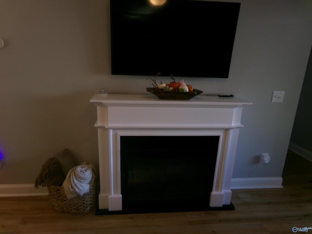 interior details featuring hardwood / wood-style floors