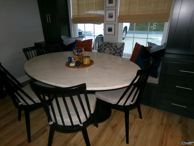 dining room featuring light hardwood / wood-style flooring