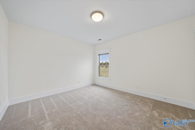 view of carpeted spare room