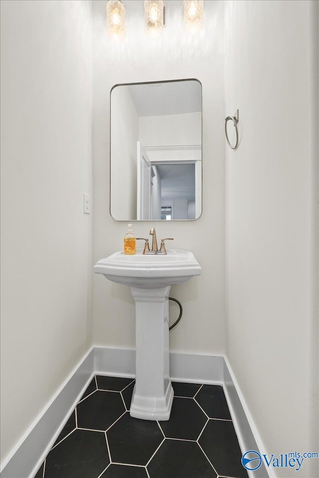 bathroom with tile patterned flooring