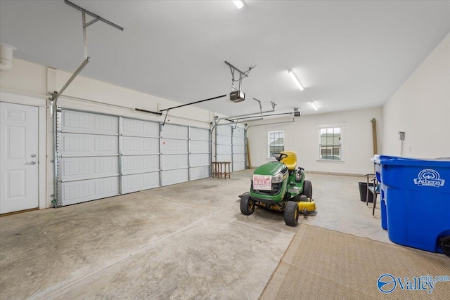 garage featuring a garage door opener