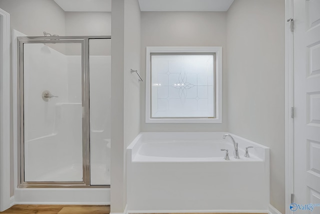 182 Saddle St, New Market, AL 35761 - bathroom featuring shower with separate bathtub
