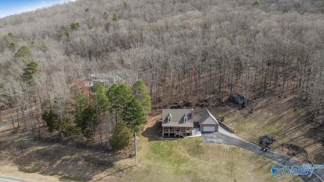 aerial view featuring a view of trees