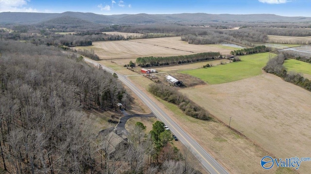 aerial view featuring a rural view and a mountain view