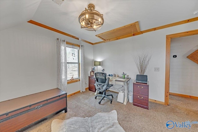 carpeted office space featuring lofted ceiling, attic access, and baseboards