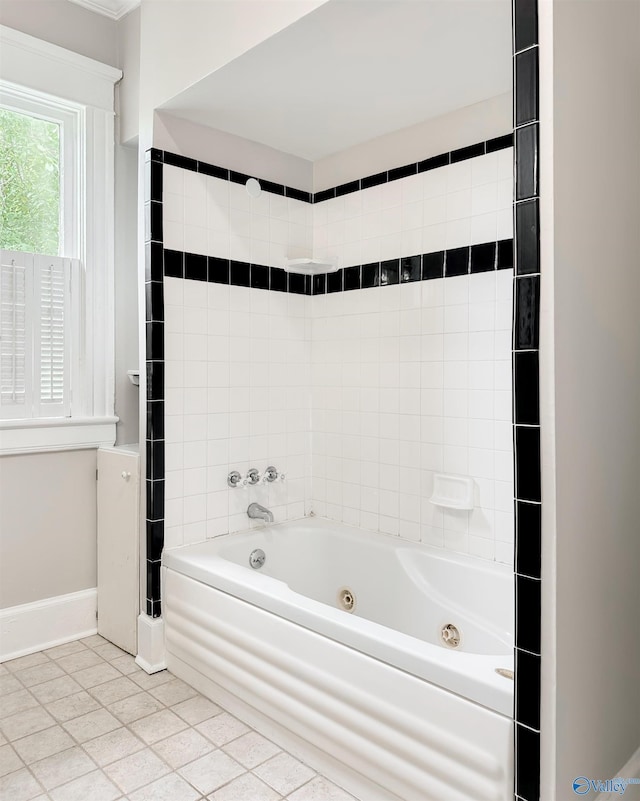 605 Ferry St, Decatur, AL 35601 - full bath featuring a combined bath / shower with jetted tub, tile patterned floors, and baseboards