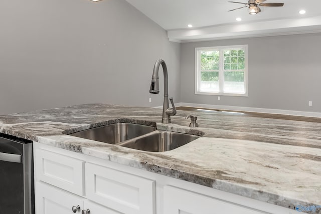 2810 Mountain View Dr, Southside, AL 35907 - kitchen with light stone counters, stainless steel dishwasher, ceiling fan, white cabinets, and recessed lighting