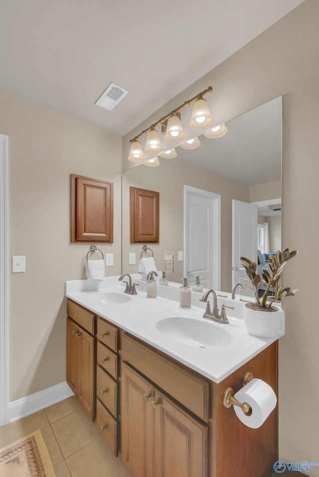 2626 SW Ashtynn Pl, Huntsville, AL 35803 - bathroom with tile patterned flooring and double vanity