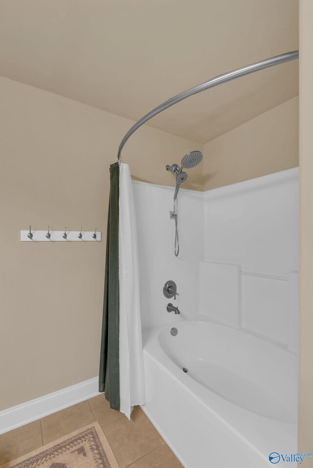 2626 SW Ashtynn Pl, Huntsville, AL 35803 - bathroom with tile patterned floors and shower / bath combination with curtain