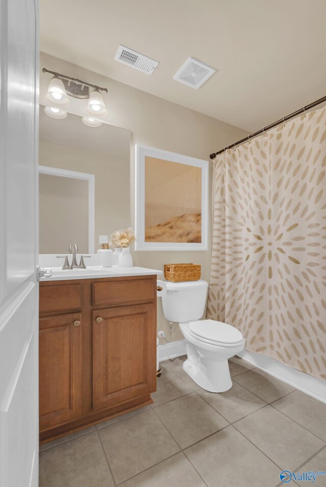 2626 SW Ashtynn Pl, Huntsville, AL 35803 - bathroom with vanity, tile patterned flooring, and curtained shower