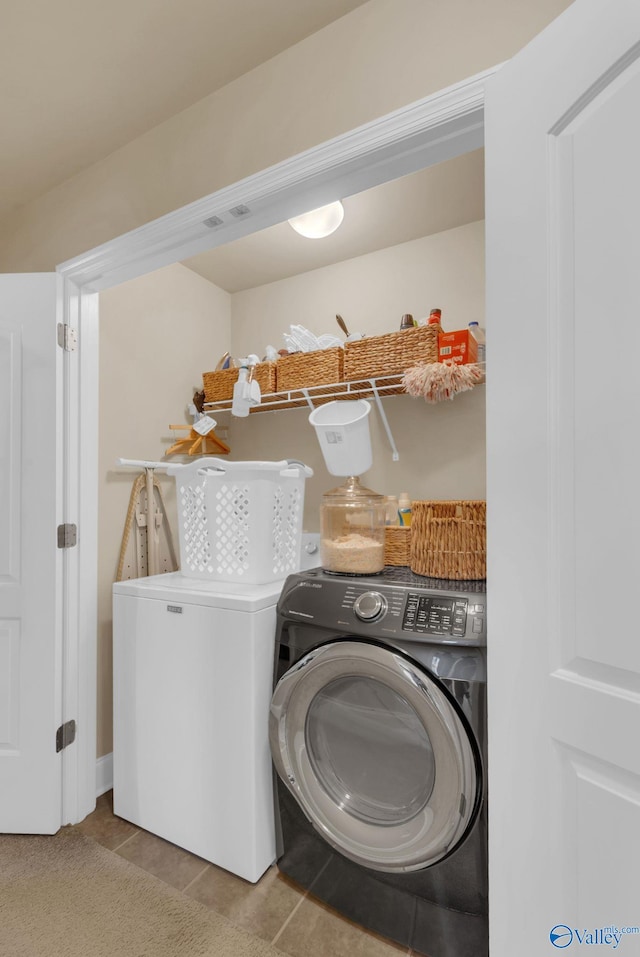 2626 SW Ashtynn Pl, Huntsville, AL 35803 - laundry area featuring washer and clothes dryer and tile patterned floors