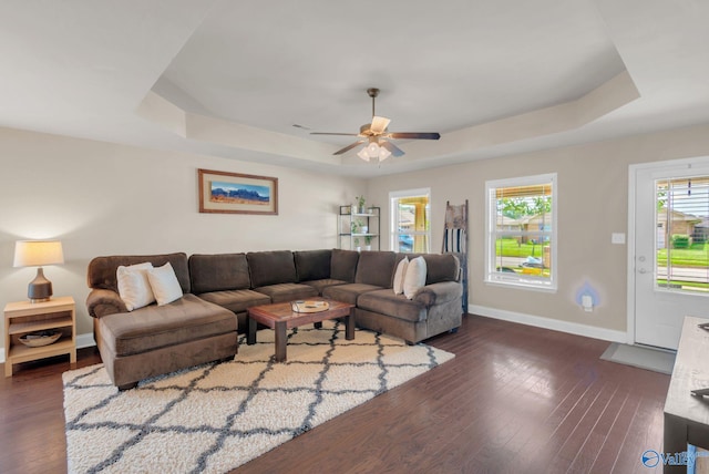 2626 SW Ashtynn Pl, Huntsville, AL 35803 - living room with a raised ceiling, hardwood / wood-style flooring, and a ceiling fan