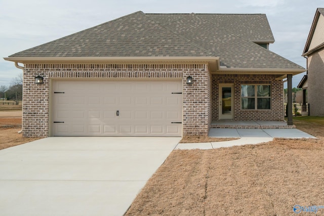 view of front of home featuring a garage