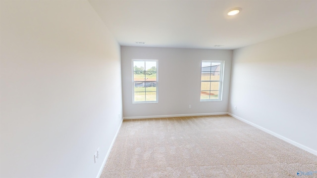 view of carpeted spare room