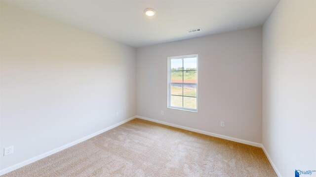 empty room with light carpet