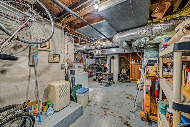 unfinished basement featuring independent washer and dryer