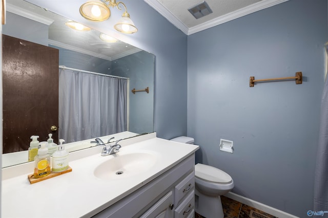 bathroom featuring toilet, vanity, and crown molding