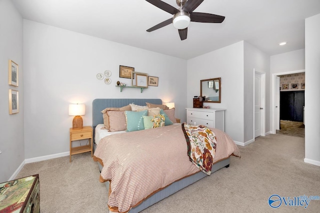 bedroom featuring ceiling fan, carpet floors, and baseboards