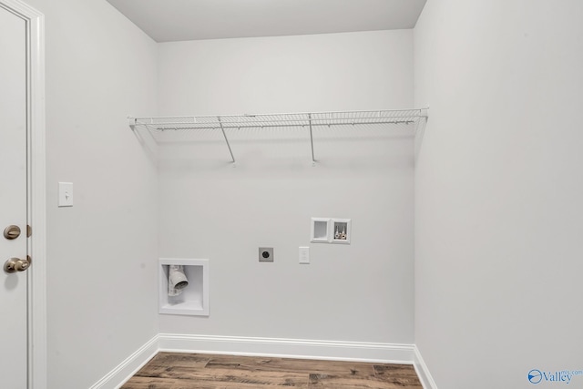 clothes washing area featuring laundry area, baseboards, wood finished floors, washer hookup, and electric dryer hookup