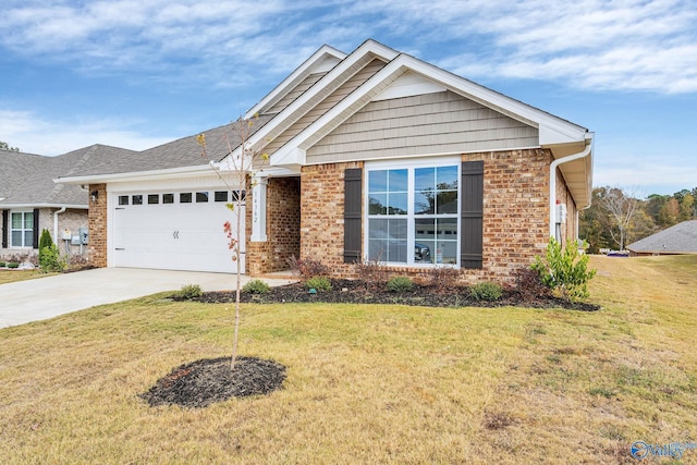 view of front of property featuring driveway, an attached garage, a front lawn, and brick siding