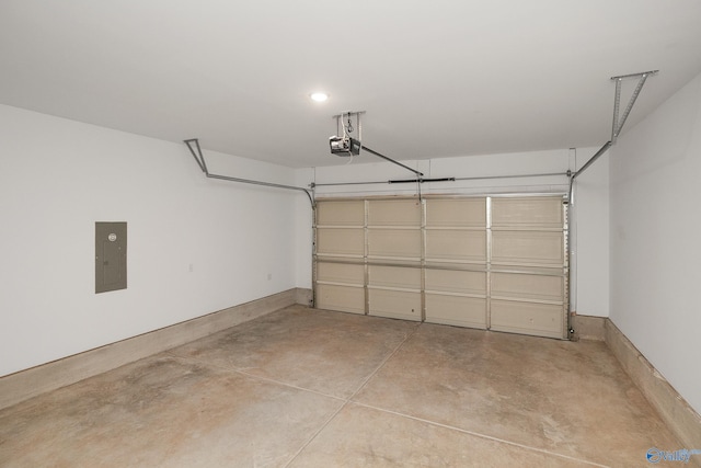 garage featuring a garage door opener and electric panel