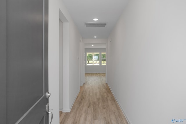 hallway featuring light hardwood / wood-style floors