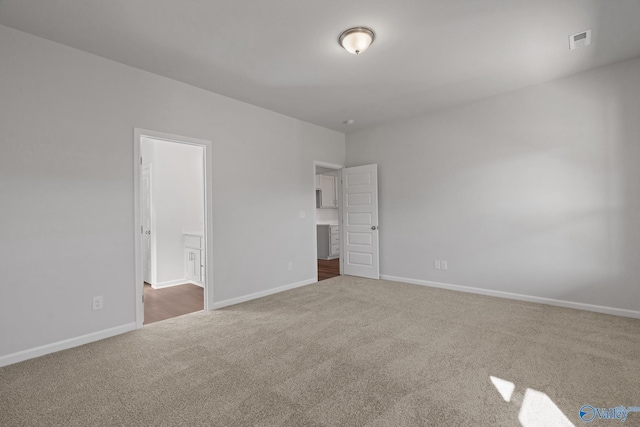 unfurnished bedroom with carpet