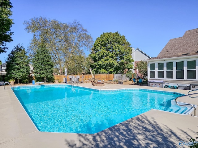 view of pool featuring a patio