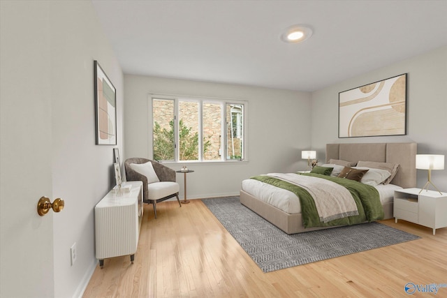 bedroom featuring wood-type flooring