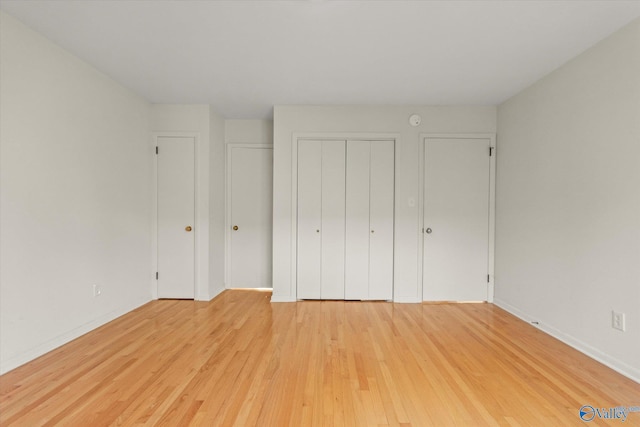 unfurnished bedroom featuring light hardwood / wood-style floors