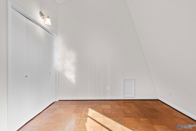 spare room with light parquet floors